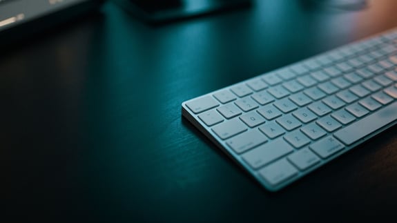 Background with keyboard on a desk