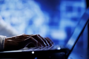 computer-operator-using-laptop-maintenance-artificial-intelligence-neural-networks-simulating-human-thought-processes-computerized-model-tech-support-doing-checkup-ai-systems-close-up