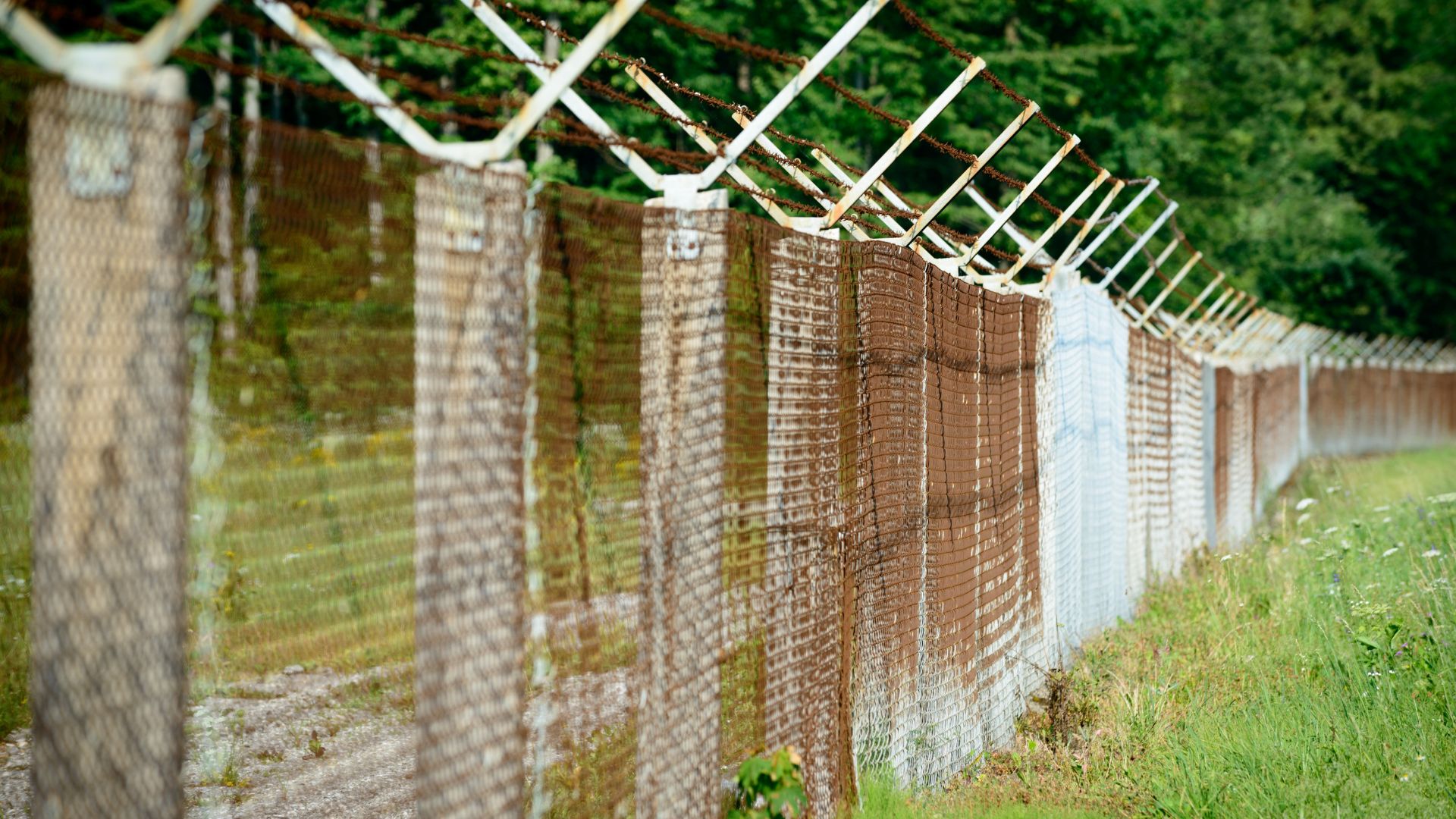 wired fence on large field